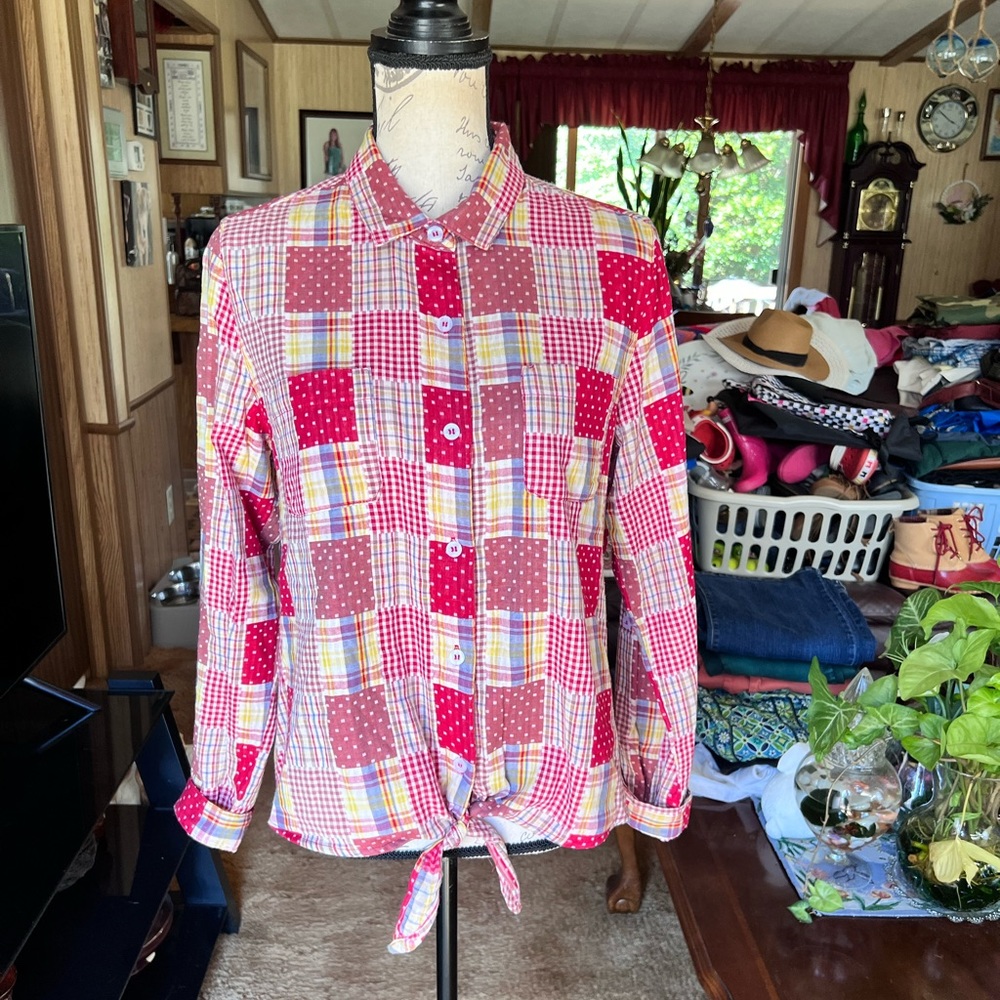 Women’s checkered button up tie bottom shirt.
